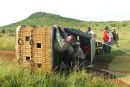 Day 10:
Thanks to a bit of axle grease.
Getting into the balloon for flight over the Serengeti
photo: Chris Wallace